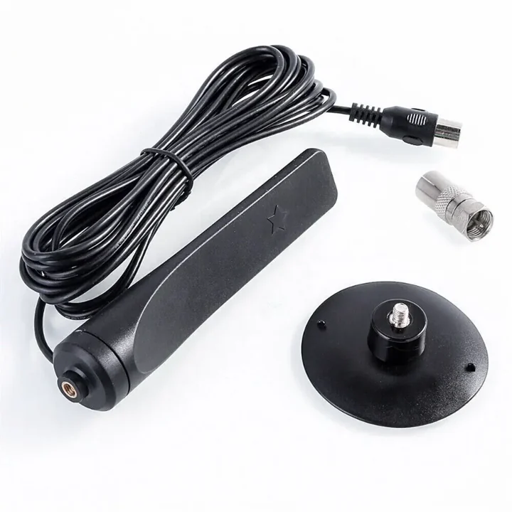 The BroadWave Antenna with its stand, long coaxial cable and connector adapter laid out on a white table